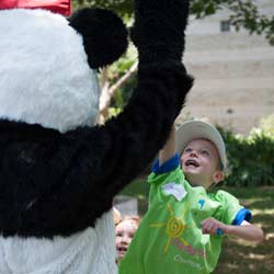 Panda Cares panda with child